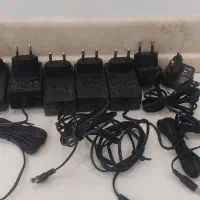 تعدادی اداپتور.کابل پاورکامپیوتر.اسپری زینکا ضدزنگ