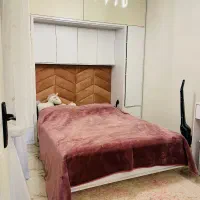 تخت دو نفره کمجا با میزارایش