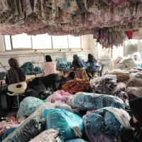 کارگاه اتوکاری و بسته بندی لباس بچگانه