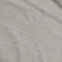 پخش حوله دستی و استخری سفید هتلی