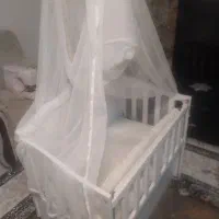 تخت نوزاد با پشه بند