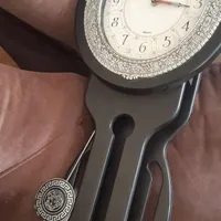ساعت دیواری آونگ دار