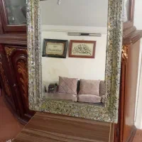 اینه.  قدی