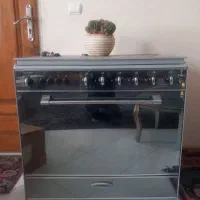 اجاق گاز ۵ شعله فردار.درب دار شیشه ای نشکن .فایر