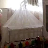 گهواره کنار مادر