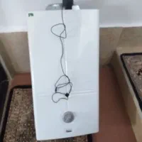 ابگرمکن دیواری بوتان ۳۲۱۵ کم فشار شمعک برقی