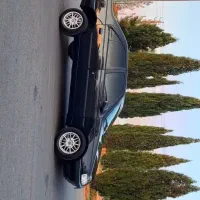 پژو مشکی عشقیه پرکالاغذی پلاک تهران
