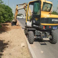اجاره مینی بیل لاستیکی چکش وپاکت|خدمات حمل و نقل|شیراز, انجیر|دیوار