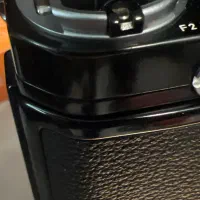 Nikon F2|دوربین عکاسی و فیلم‌برداری|تهران, فلسطین (میدان انقلاب)|دیوار