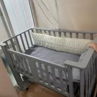 تخت بچه گهواره ای بغل تخت مادر هم میمونه