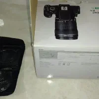 Canon EOS 700D + 18-135 STM همراه پایه