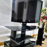 فروش میز تلویزیون شیشه ای محکم و سالم