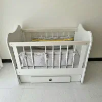 تخت گهواره ای کنار مادر