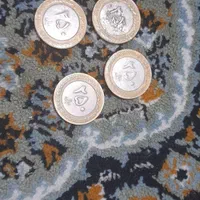 تعدادی سکه واسکناس