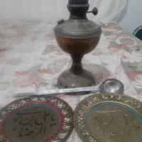 تعدادی وسایل مسی وبرنجی چراغ لمپا وملاقه وغیره