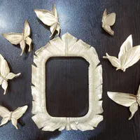 تزئینی قاب و پروانه