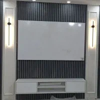 دیوار کوب شمشیری