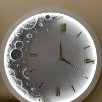 ساعت ماه و ساعت رزینی