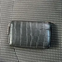 کیف پول مشکی ب همراه مدارک گمشده رضائیان