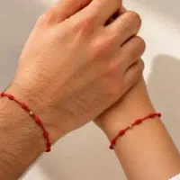 دستبند رد استرینگ و هفت گره