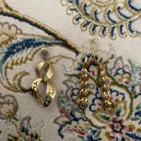 گشواره و پلاک طلا در حد نو