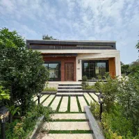 ویلاباغ-نمامدرن-در-باغ-مرکبات-محیط-سرسبز-بانگهبانی