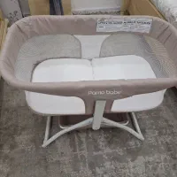 گهواره تخت کنار مادر