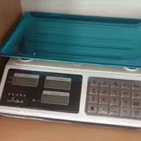 ترازو،دکمه برجسته فلزی