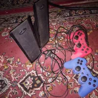 اسپیکر xp product و یک جفت دسته گیم pc