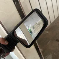 آینه پژو پارس برقی با آرم جلو پنجره نو
