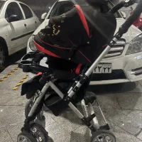 کالسکه در حد نو و تشک بازی کودک