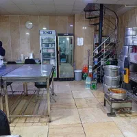 کمک آشپز و پیک موتوری