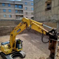 راننده بیل مکانیکی هستم