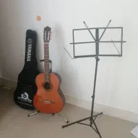 گیتار یاماها c70 همراه باکیف، استند گیتار ودفترچه