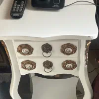 تلفن بی سیم و میز دو کشو