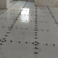 کاشی کاری و بازسازی تخریب.