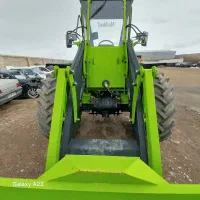 مینی لودر و تراکتور بیل عقب