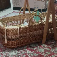 سبد نوزاد و تخت کنار مادر