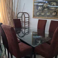 میز وصندلی ناهار خوری ومجسمه شکستنی