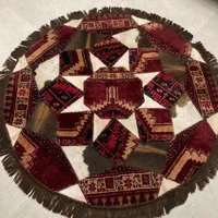 فرش گرد دستباف و چرم گاو