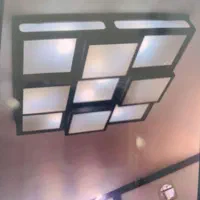 لوستر بسیار شیک و مدرن چوبی زیبا پرنور