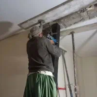 پیکور با کارگرافغا نی تخریب ساختمان وبازسازی مناسب
