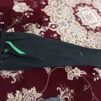 شلوار اسلش نو یکبار هم پوشیده نشده پاچه زیپ دار