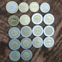 تعدادی اسکناس و سکه قدیمی