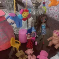 عروسک وآویز تخت کودک