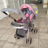 کالسکه و کیف کودک