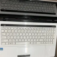 لپ‌تاپ ASUS سفید و بسیار تمیز