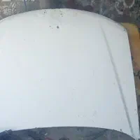 کاپوت ‌پارس‌و‌وسایل‌پراید‌.در‌سمت‌راننده‌عقب‌پراید