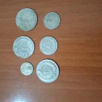 ۵۵ عدد سکه شاهی و چهار فقره اسکناس