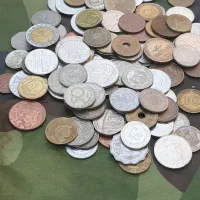 ۲۰۰عدد سکه خارجی